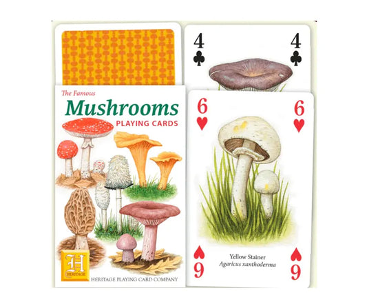 Playing cards featuring mushroom illustrations on a white background