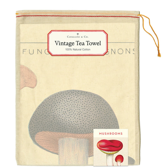 Vintage tea towel with mushroom design and Cavallini & Co branding