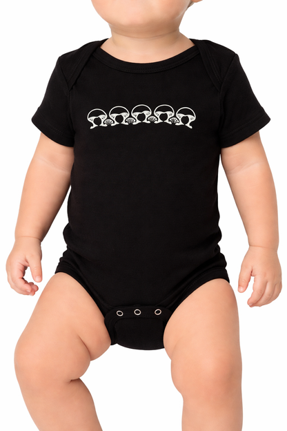 Black baby onesie with white graphic design on a plain background