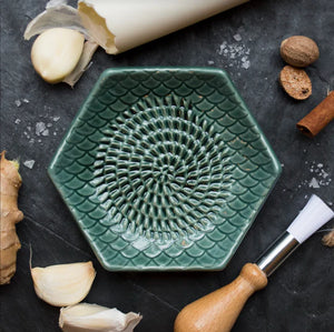 
                  
                    The Grate Plate Handmade Ceramic Grater (Includes Garlic Peeler & Brush)
                  
                