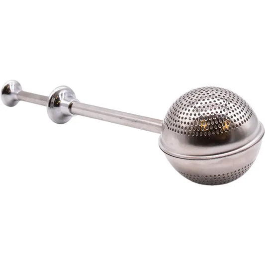 Metallic tea ball infuser on a white background